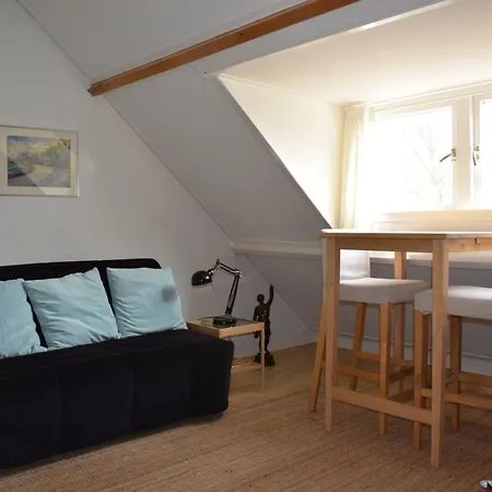 Tegenover De Molen Couette-café *